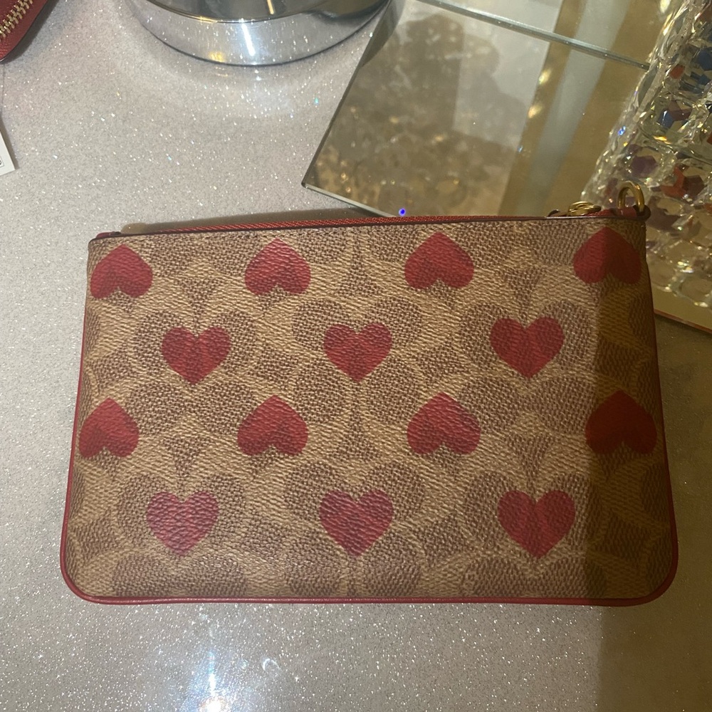 COACH Tan hearts wristlet